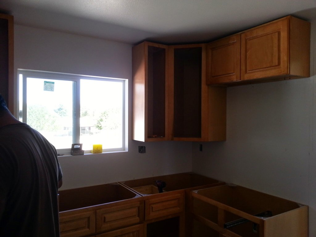 Natural wood cabinet installation in Hacienda Heights kitchen remodel