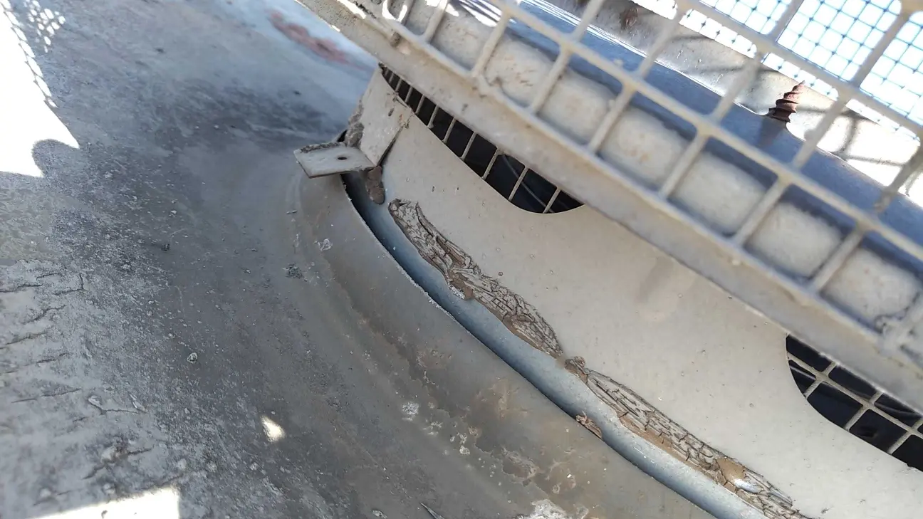 Close-up of the chimney cap rain entry point during Beaumont water damage restoration project by PL Builders