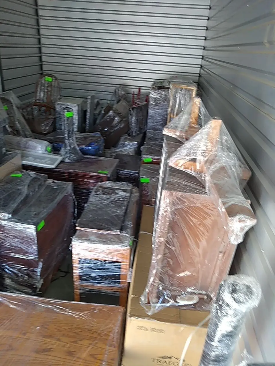 Large packout storage unit for protected contents during Beaumont water damage restoration project by PL Builders