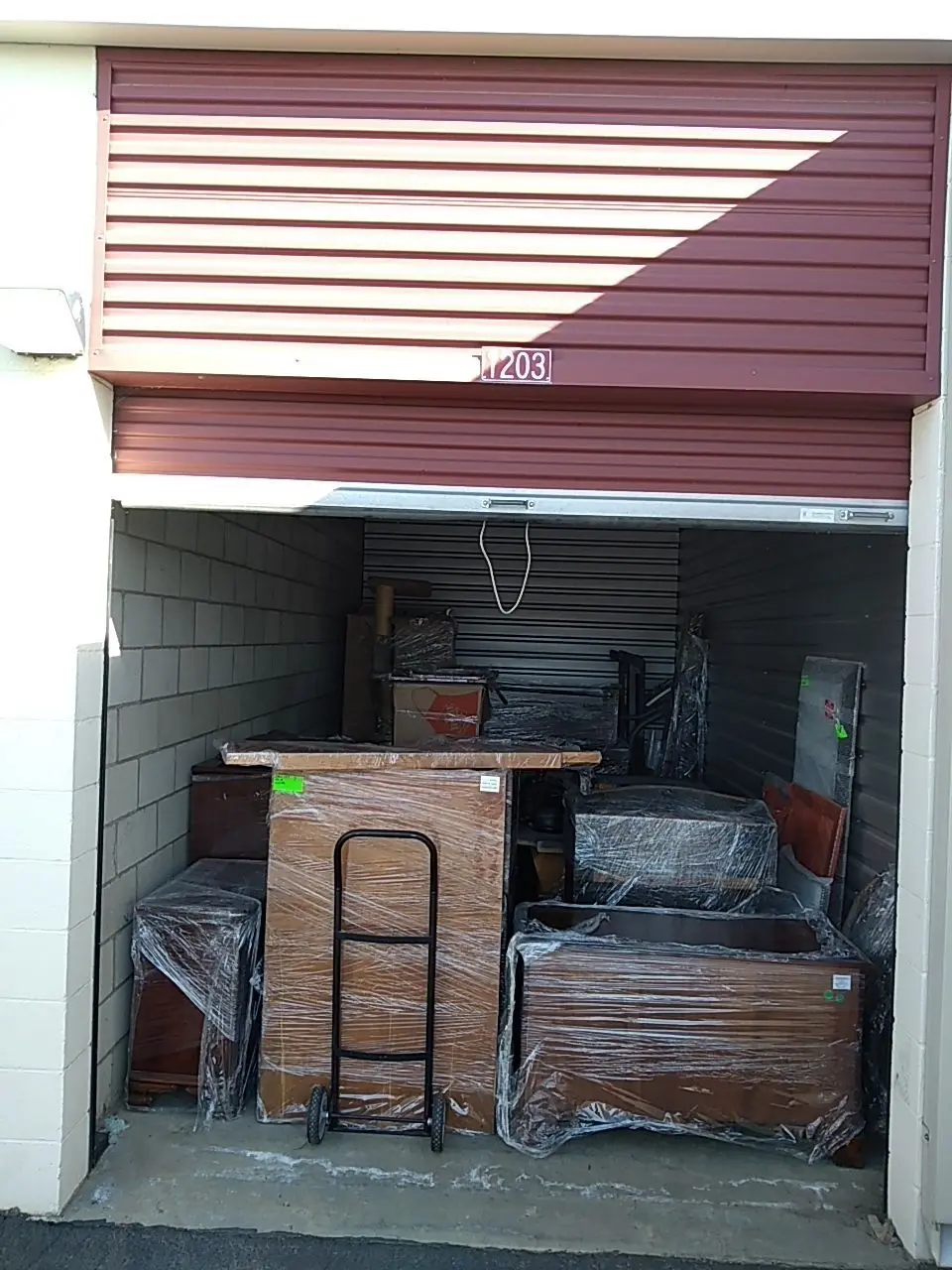 Storage unit after contents packout during Beaumont water damage restoration project by PL Builders