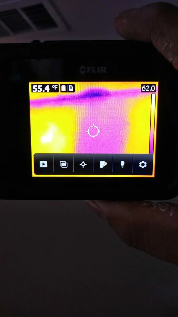 Thermal camera reading during the water source review during Beaumont water damage restoration project by PL Builders