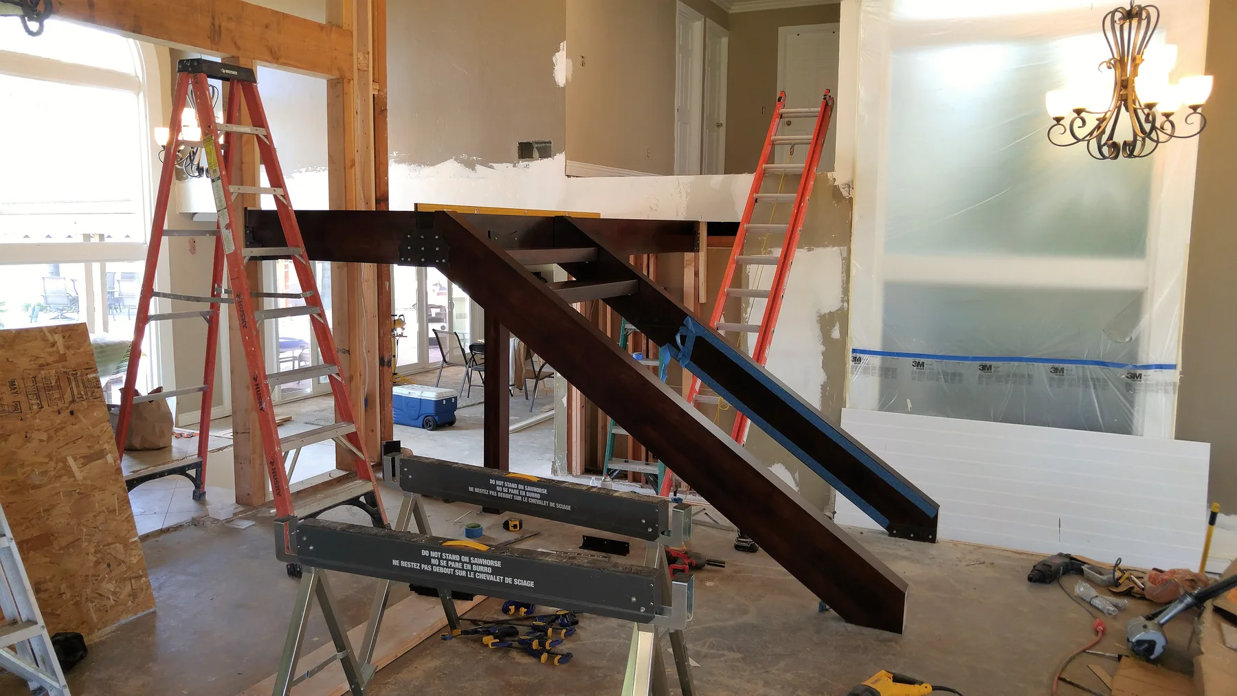 Corona custom stair rebuild project by PL Builders showing custom stair structure rebuilt with new support framing