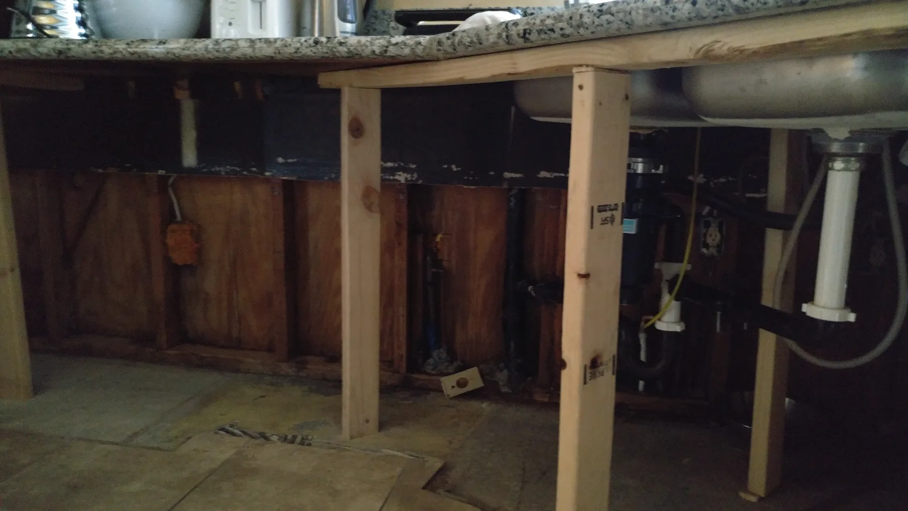 Fontana slab leak kitchen water damage restoration project by PL Builders