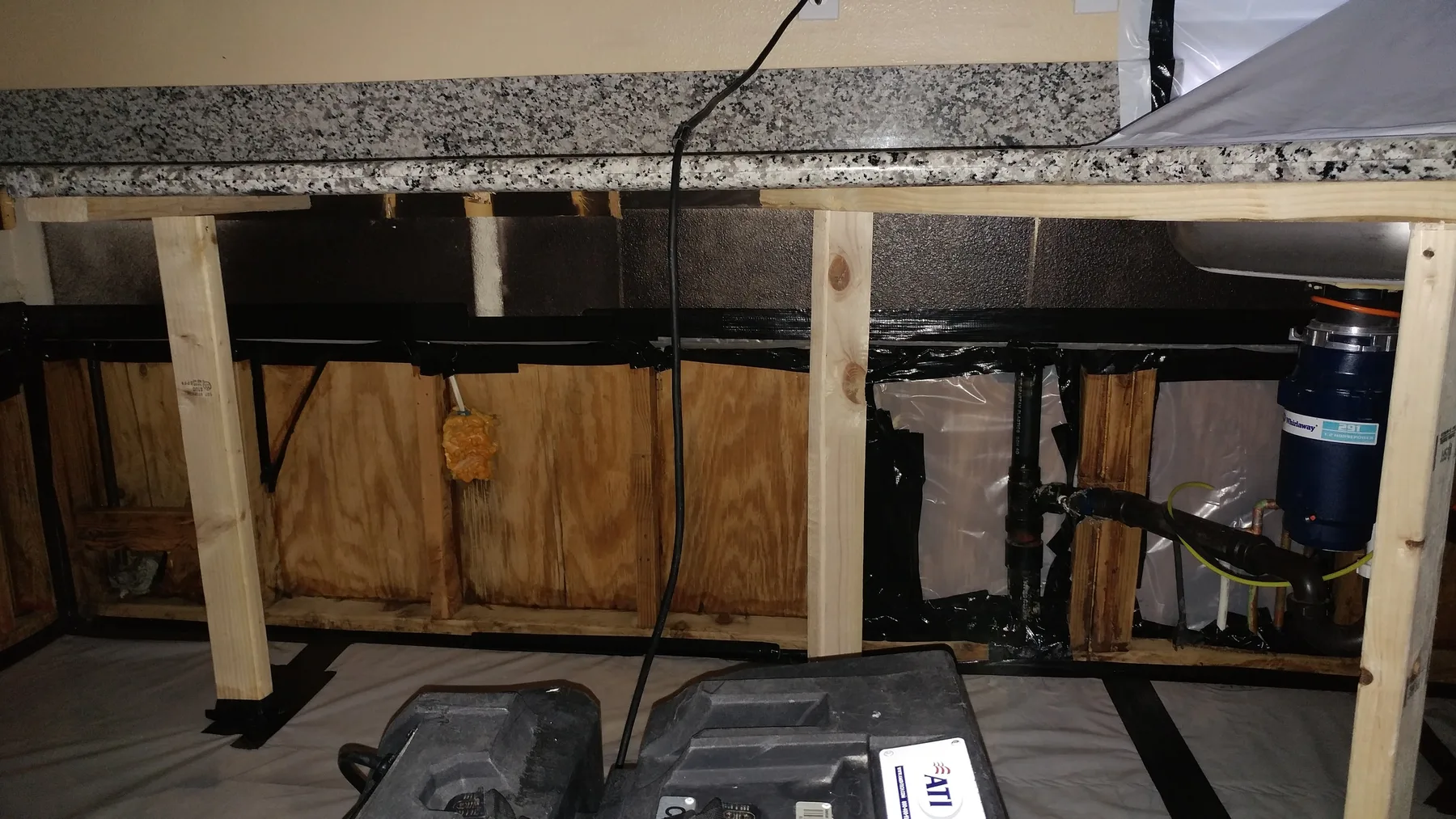 Fontana slab leak kitchen water damage restoration project by PL Builders
