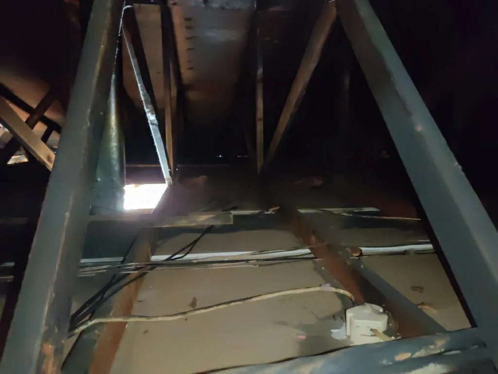 Structural Attic Transition Electrical Box Charred Trusses from Hemet apartment fire smoke damage restoration documentation - photo 106 of 180