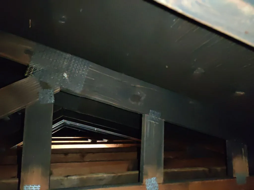 Structural Attic Transition Electrical Box Charred Trusses from Hemet apartment fire smoke damage restoration documentation - photo 110 of 180