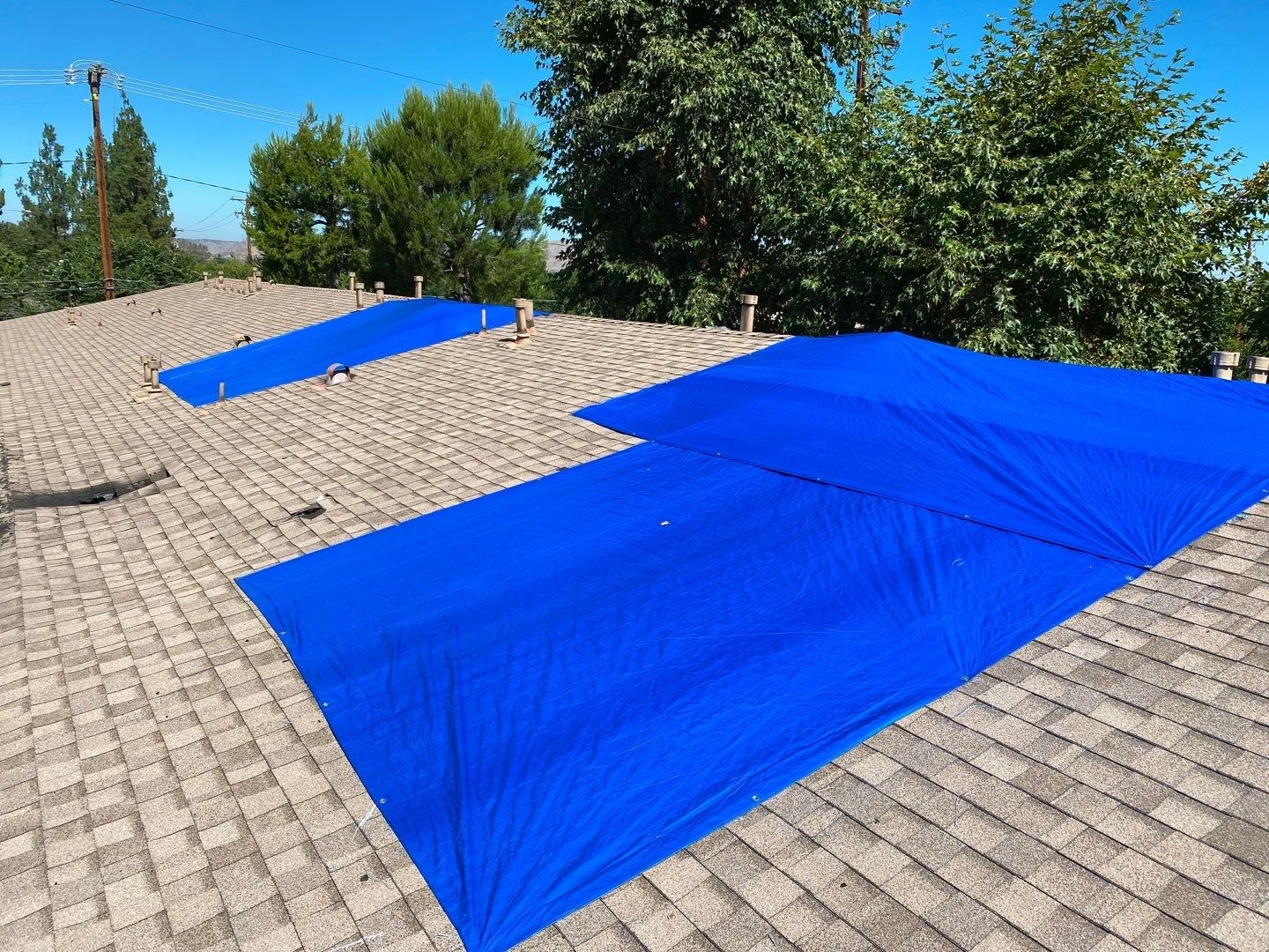 Roof Mitigation Blue Tarp Shingle Roof OSB Patch from Hemet apartment fire smoke damage restoration documentation - photo 116 of 180