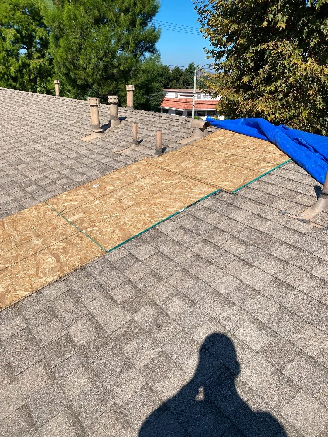 Roof Mitigation Blue Tarp Shingle Roof OSB Patch from Hemet apartment fire smoke damage restoration documentation - photo 122 of 180