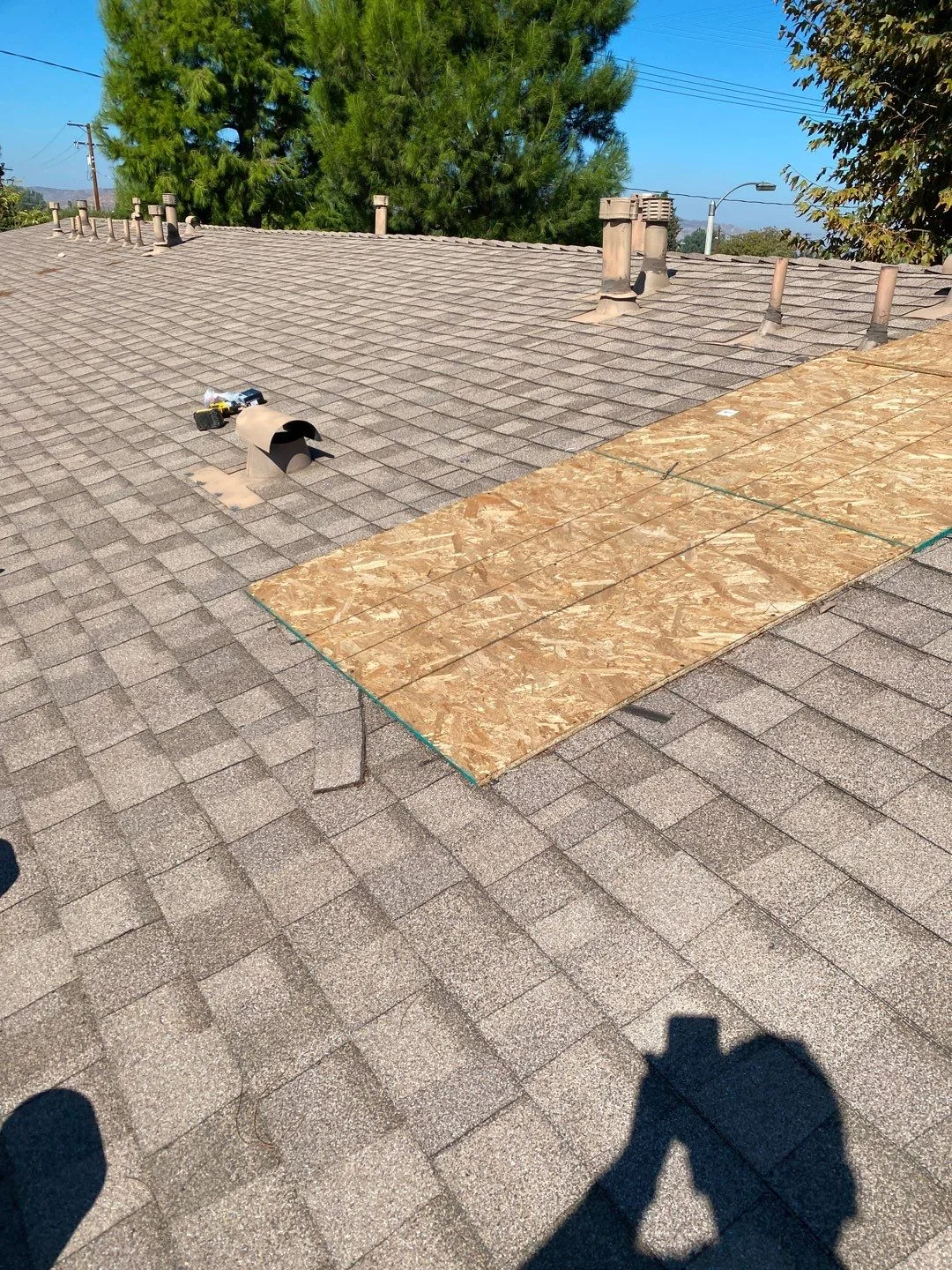 Roof Mitigation Blue Tarp Shingle Roof OSB Patch from Hemet apartment fire smoke damage restoration documentation - photo 123 of 180