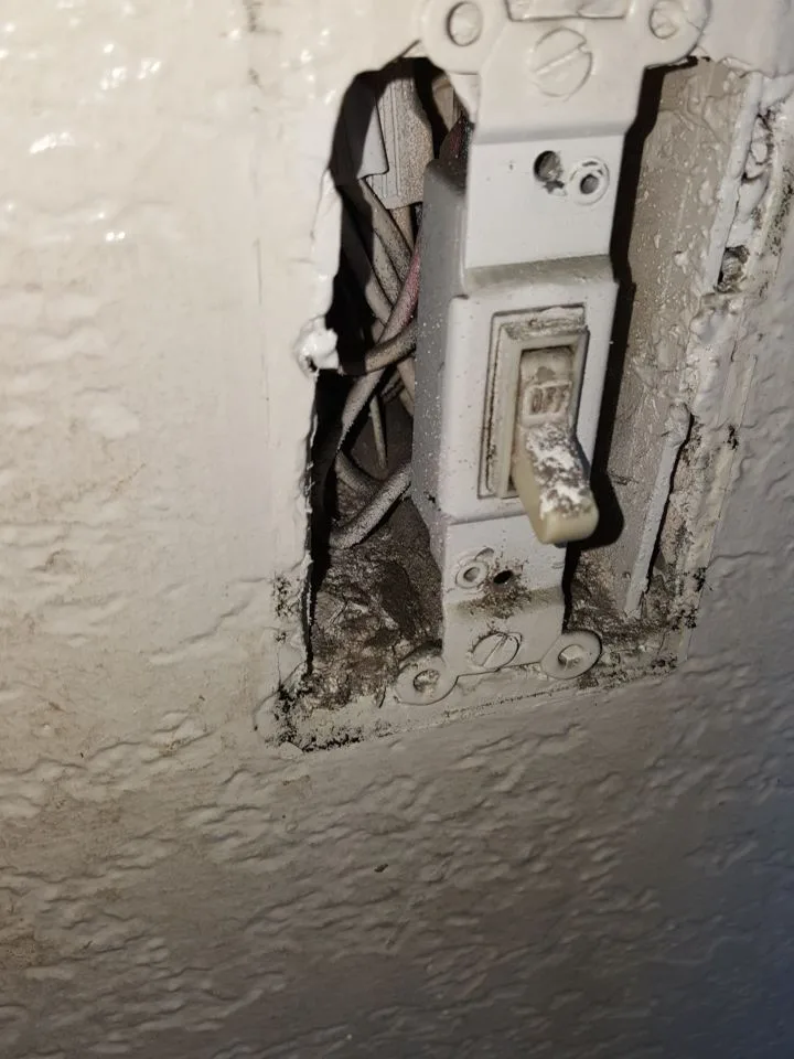 Heavy Soot Staining HVAC Register Switch Box Open Wall from Hemet apartment fire smoke damage restoration documentation - photo 133 of 180