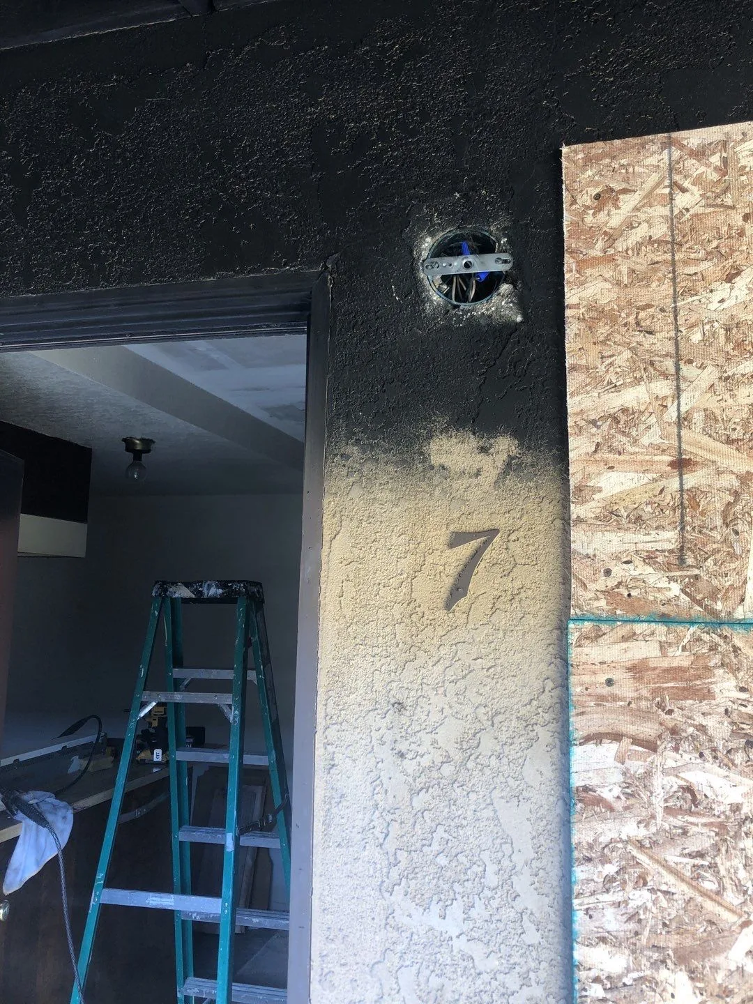 Wall Sampling Insulation Outlet Drywall Opening from Hemet apartment fire smoke damage restoration documentation - photo 147 of 180