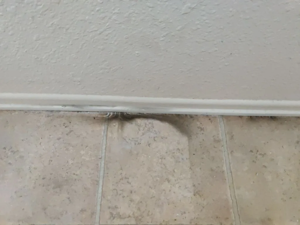 Outlet Baseboard Tub Edge Trim Sampling from Hemet apartment fire smoke damage restoration documentation - photo 75 of 180