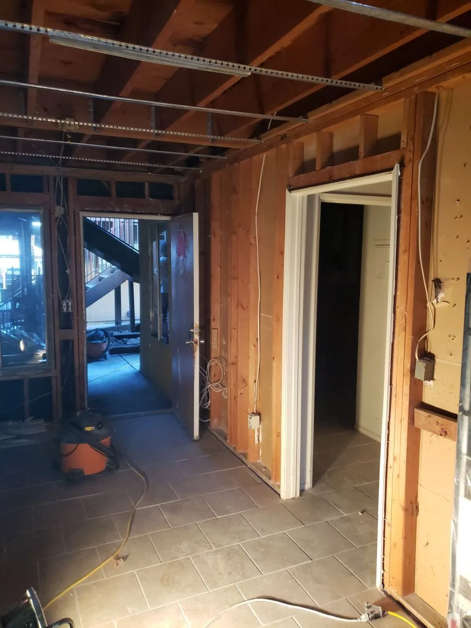 Major Interior Demolition Ceiling Open Framing Insulation Removal from Hemet apartment fire smoke damage restoration documentation - photo 84 of 180