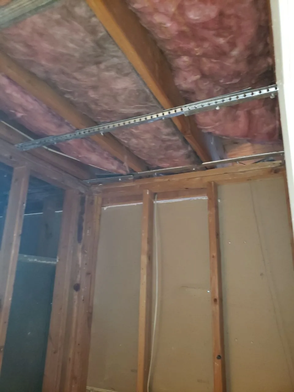 Major Interior Demolition Ceiling Open Framing Insulation Removal from Hemet apartment fire smoke damage restoration documentation - photo 87 of 180