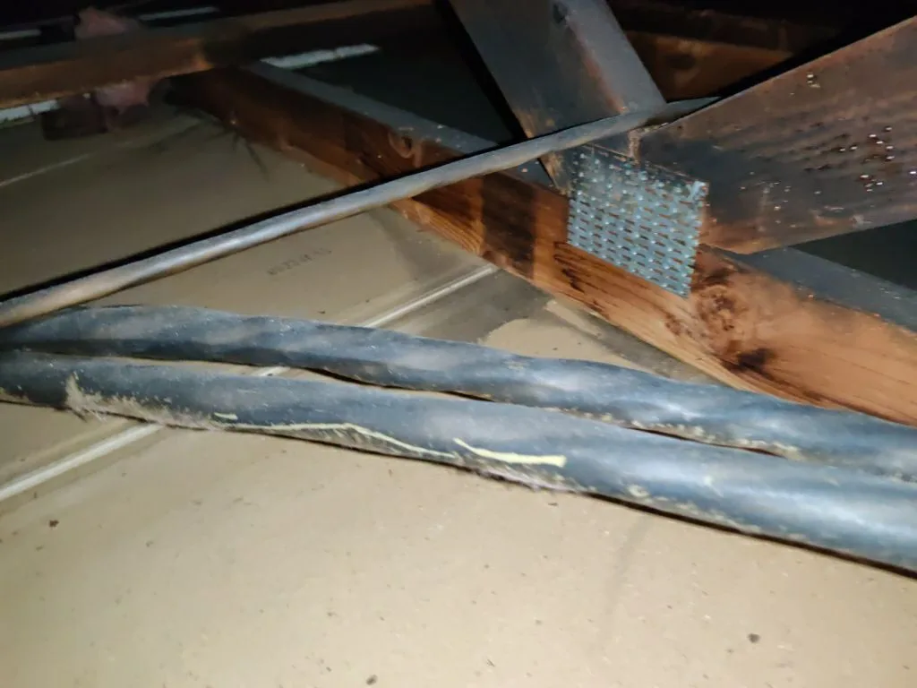 Attic Fire Damage Charred Trusses Roof Framing HVAC Soot from Hemet apartment fire smoke damage restoration documentation - photo 98 of 180