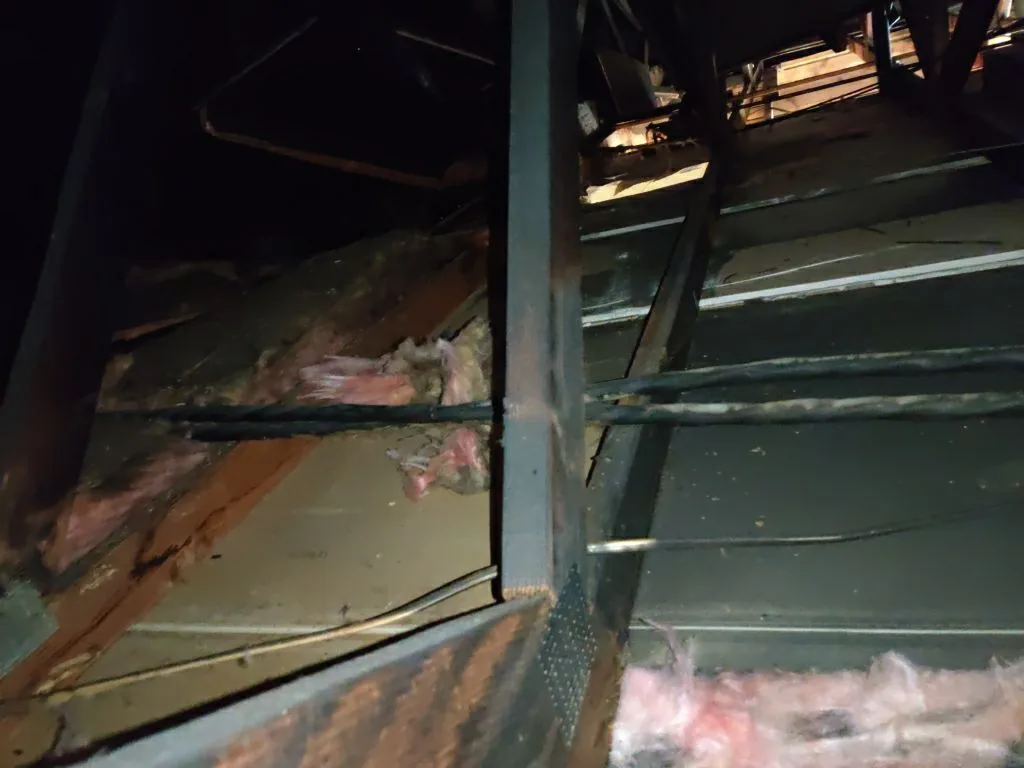 Attic Fire Damage Charred Trusses Roof Framing HVAC Soot from Hemet apartment fire smoke damage restoration documentation - photo 99 of 180