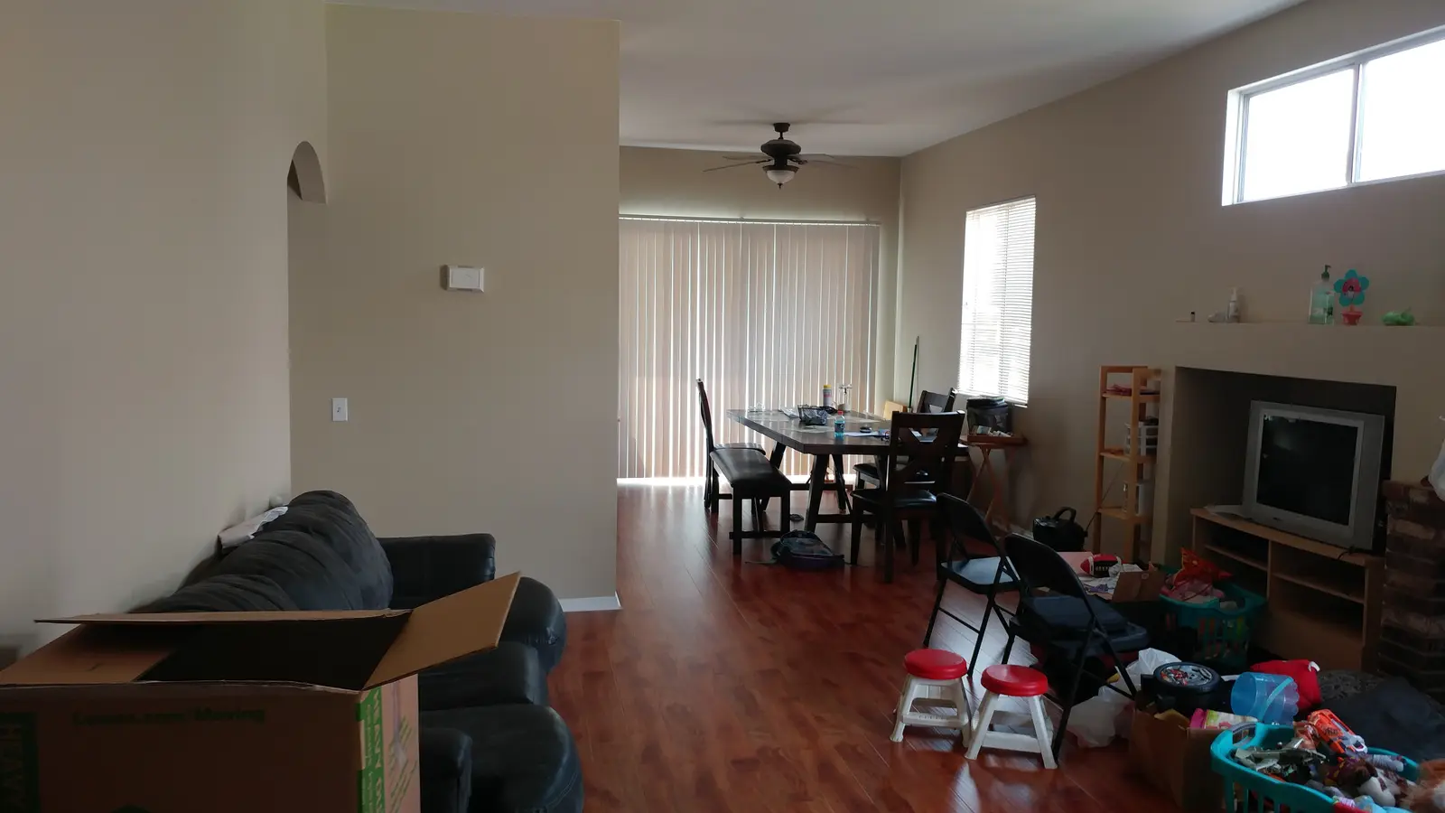 Jurupa Valley burst pipe kitchen water damage restoration project by PL Builders showing finished living room flooring after burst pipe restoration