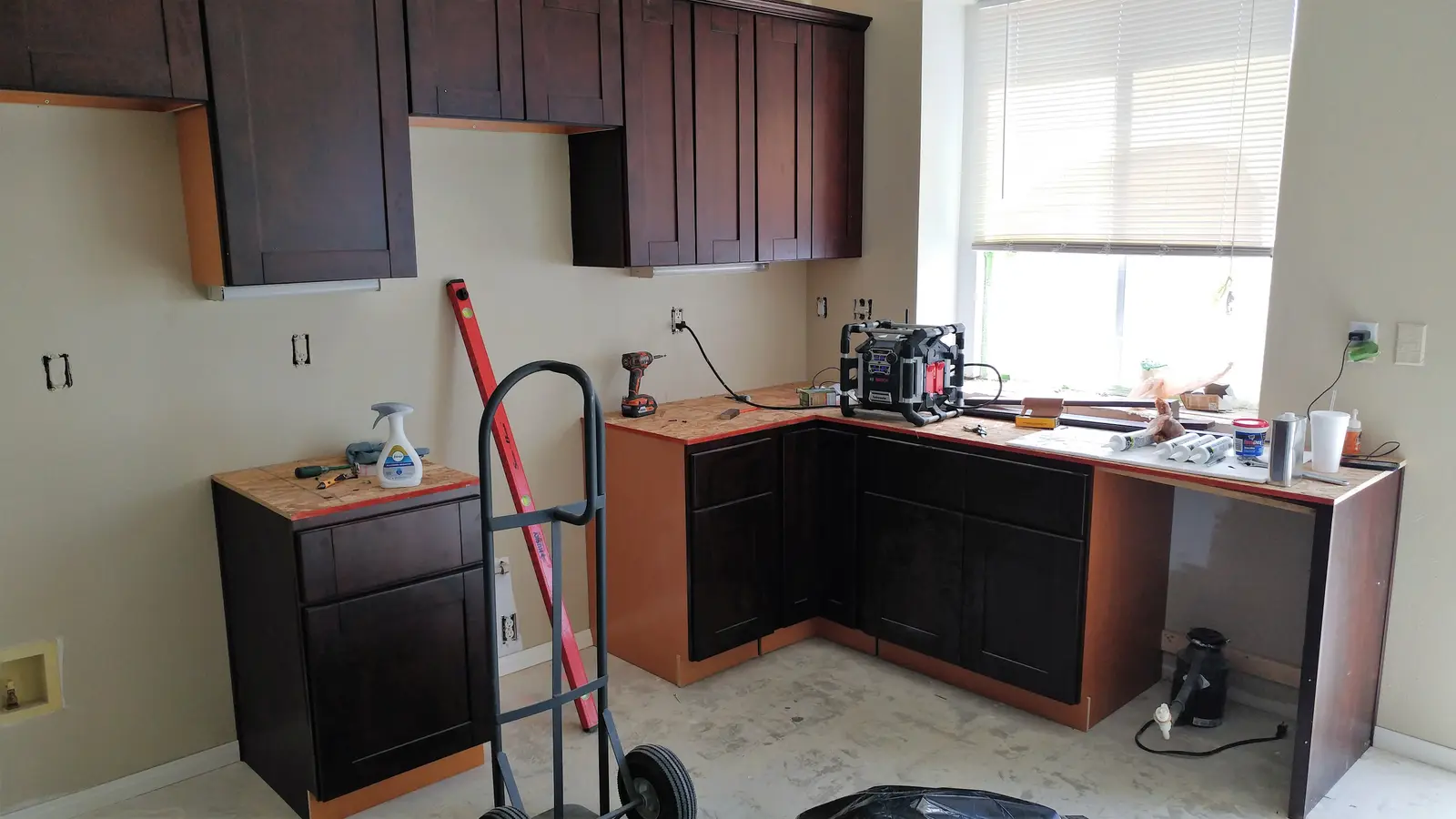 Jurupa Valley burst pipe kitchen water damage restoration project by PL Builders showing kitchen repair progress during burst pipe reconstruction