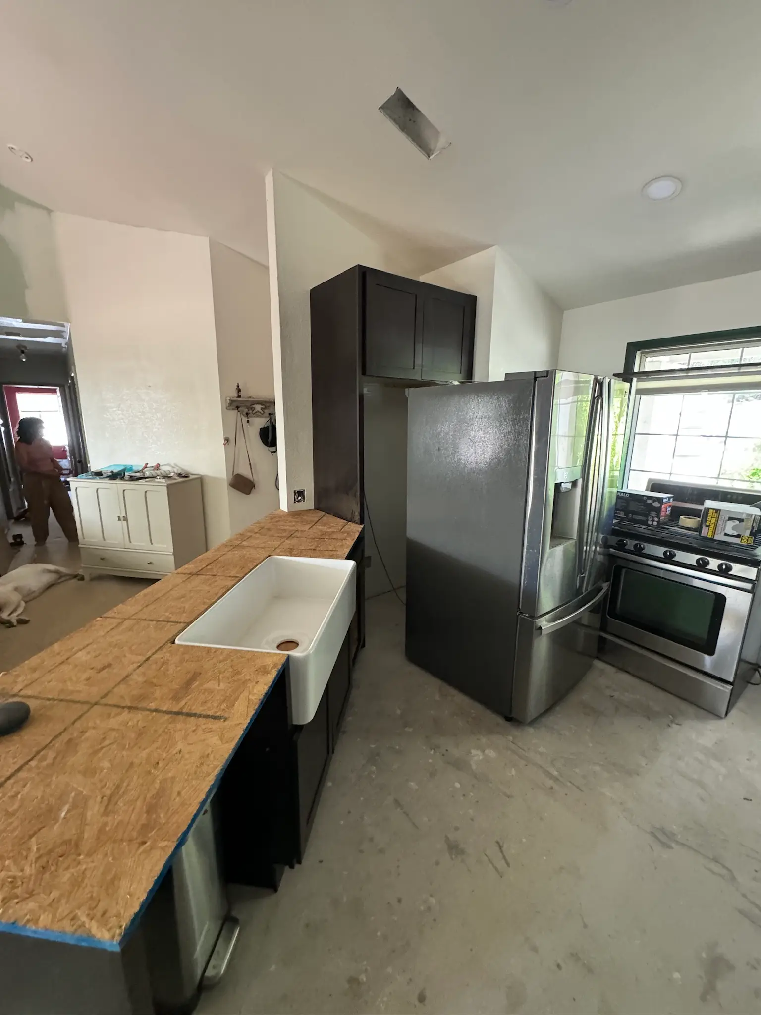 Kitchen repair progress after refrigerator leak 068 during Menifee water damage restoration project by PL Builders