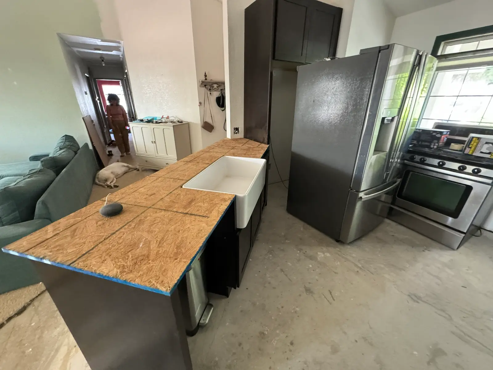 Kitchen repair progress after refrigerator leak 069 during Menifee water damage restoration project by PL Builders