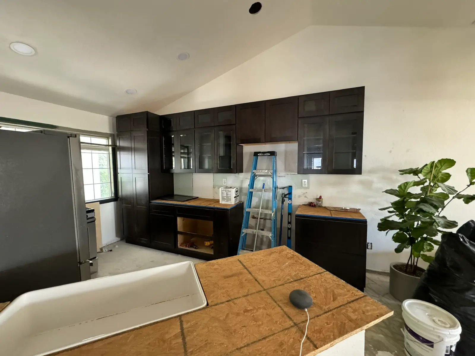 Kitchen repair progress after refrigerator leak 071 during Menifee water damage restoration project by PL Builders