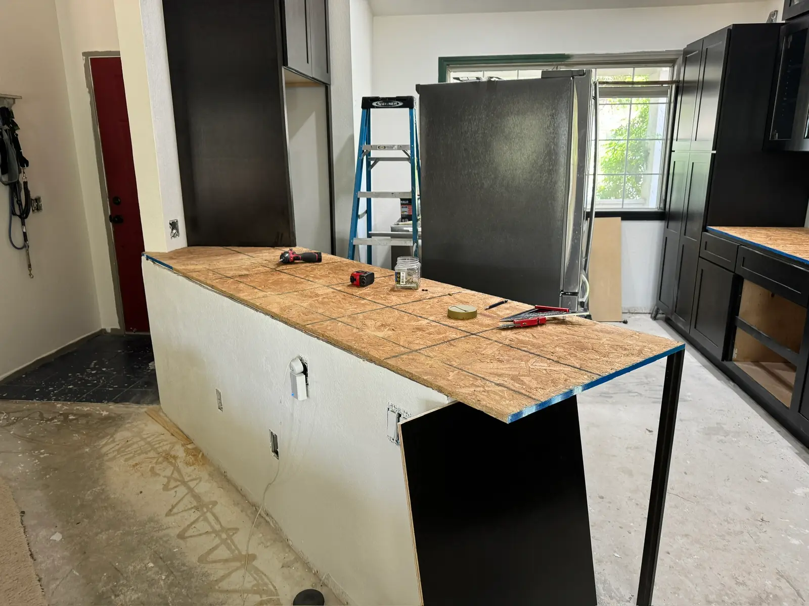 Kitchen repair progress after refrigerator leak 074 during Menifee water damage restoration project by PL Builders