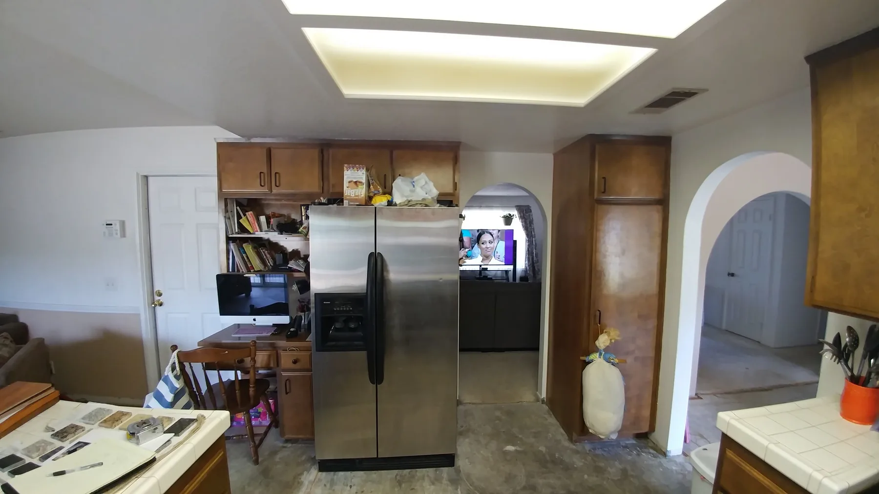 Moreno Valley slab leak kitchen water damage repair project by PL Builders showing kitchen overview before slab leak repair was finished