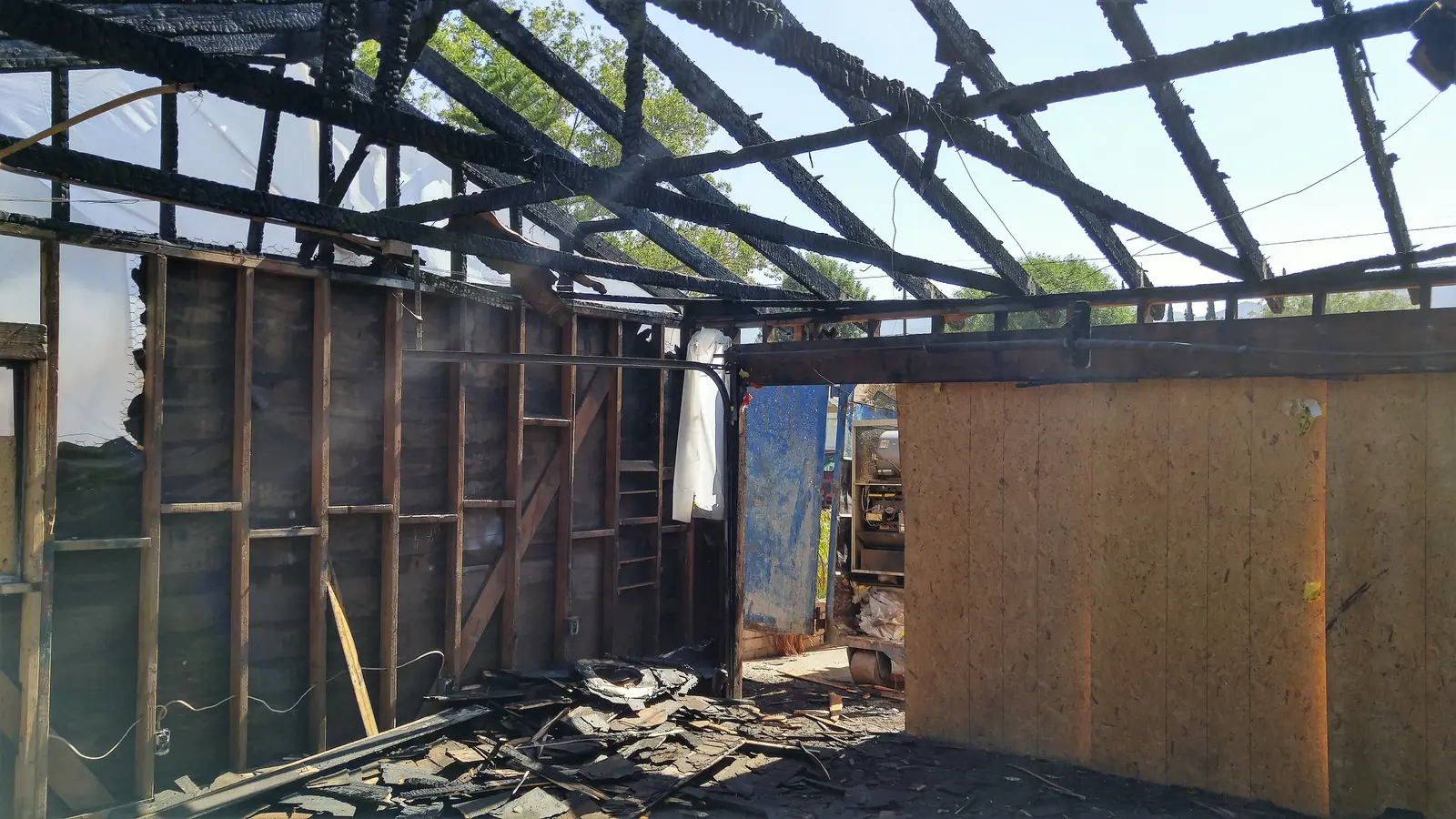 San Bernardino fire damage restoration project by PL Builders showing garage fire damage rebuild