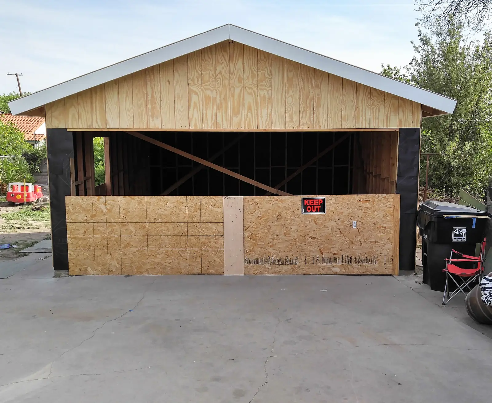 San Bernardino fire damage restoration project by PL Builders showing garage fire damage rebuild