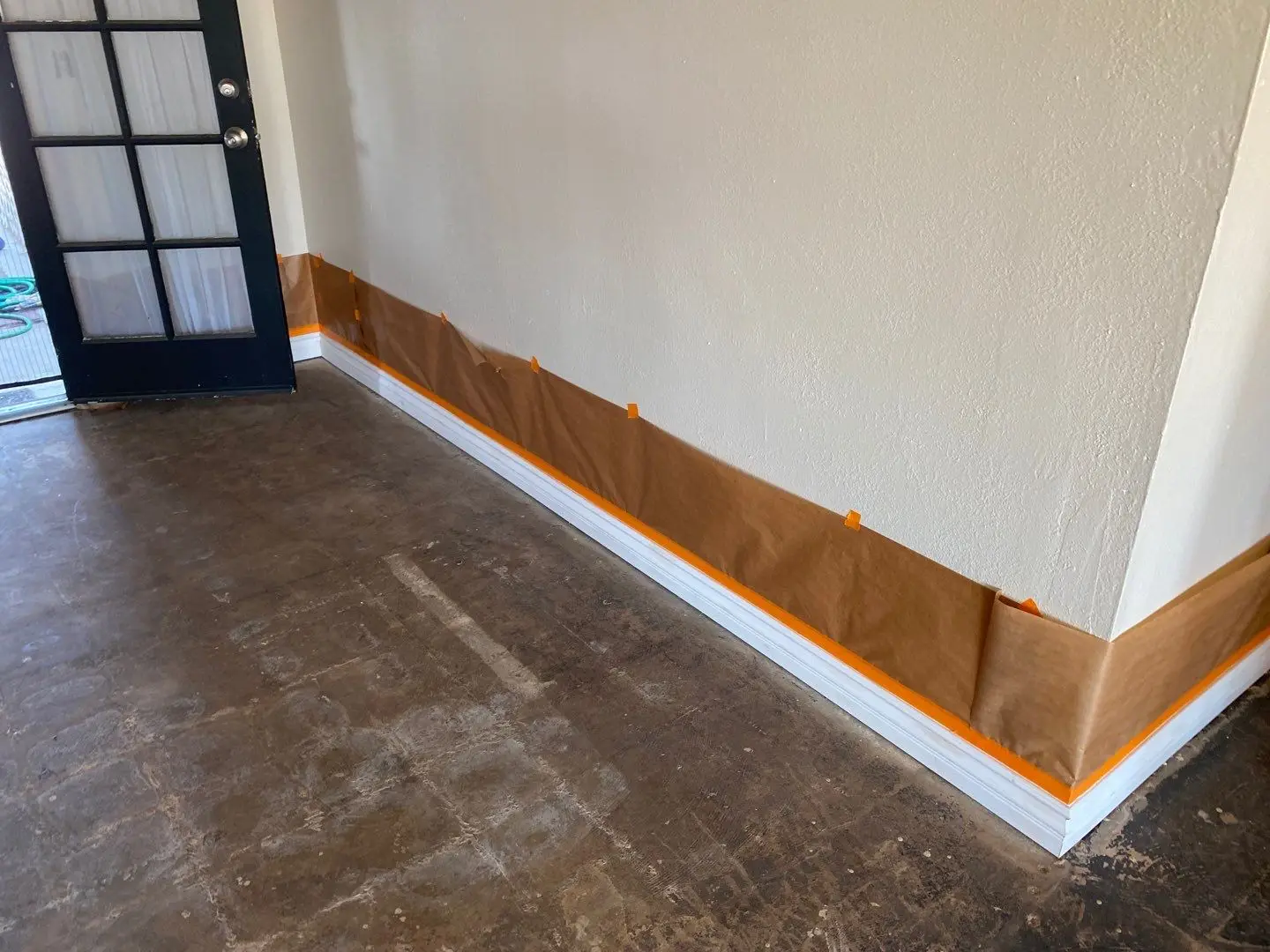San Jacinto slab leak packout and flooring project by PL Builders showing baseboard and drywall finish repair after water damage