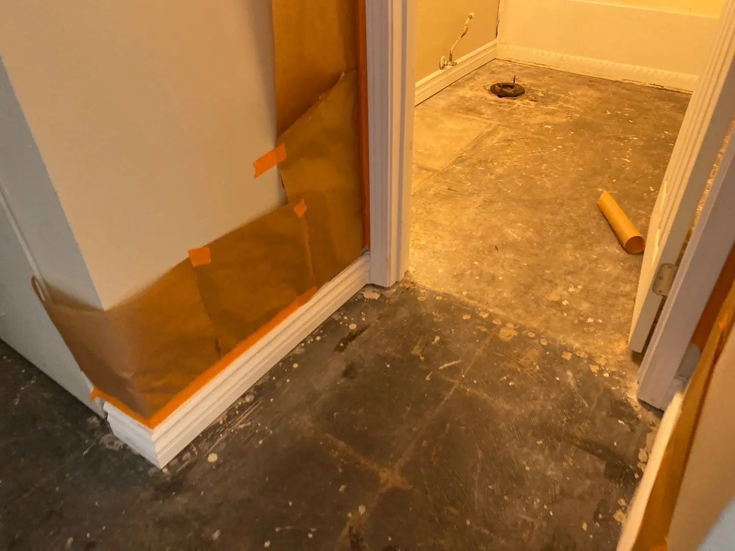 San Jacinto slab leak water damage repair by PL Builders showing flooring and baseboard repair progress after packout