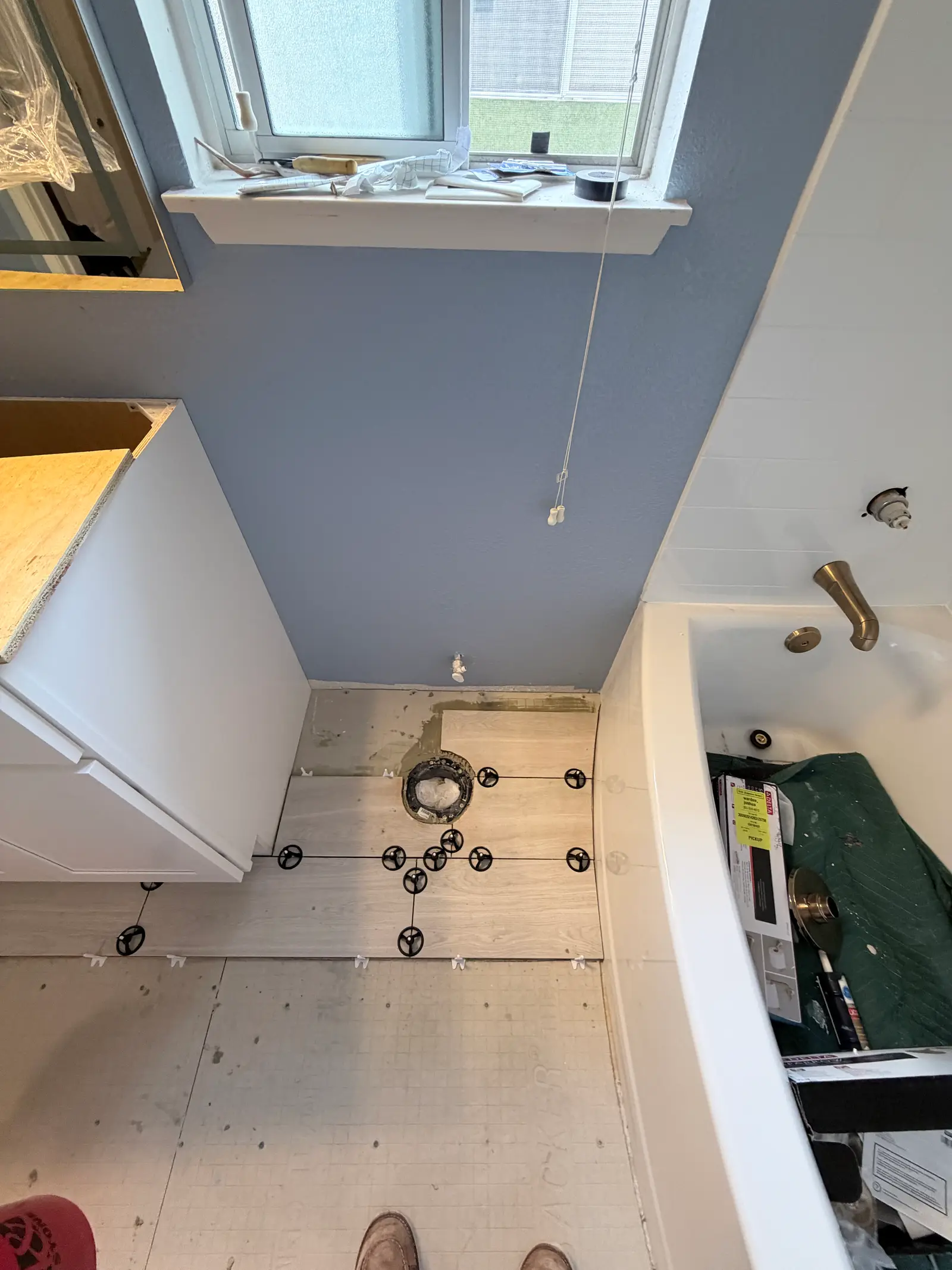 Bathroom floor and toilet area after repair during Temecula water damage restoration project by PL Builders