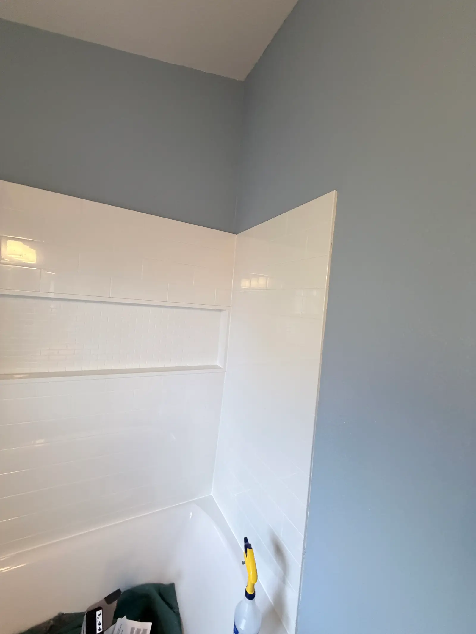 Bathroom wall finish after reconstruction during Temecula water damage restoration project by PL Builders