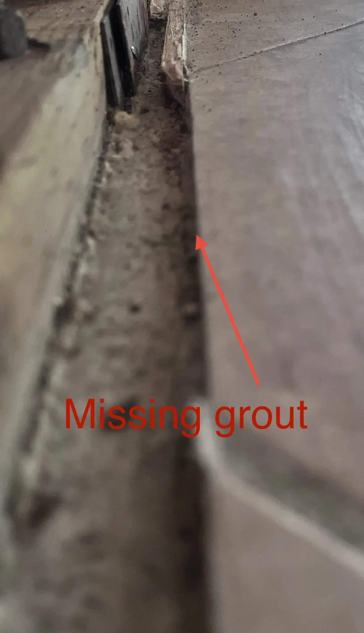 Marked moisture line at wall and floor edge during Temecula water damage restoration project by PL Builders