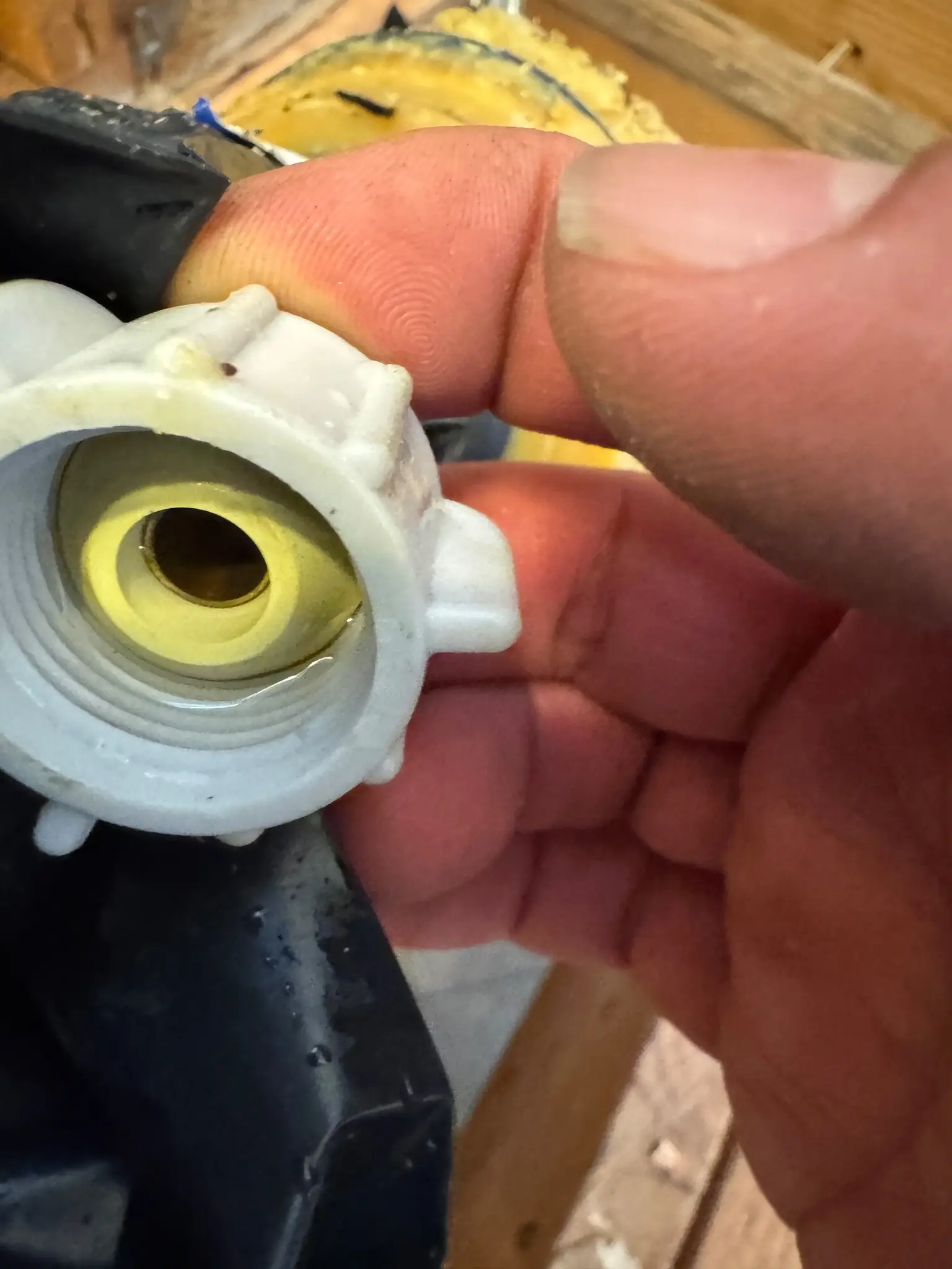 Toilet drain pipe fitting documented after leak during Temecula water damage restoration project by PL Builders