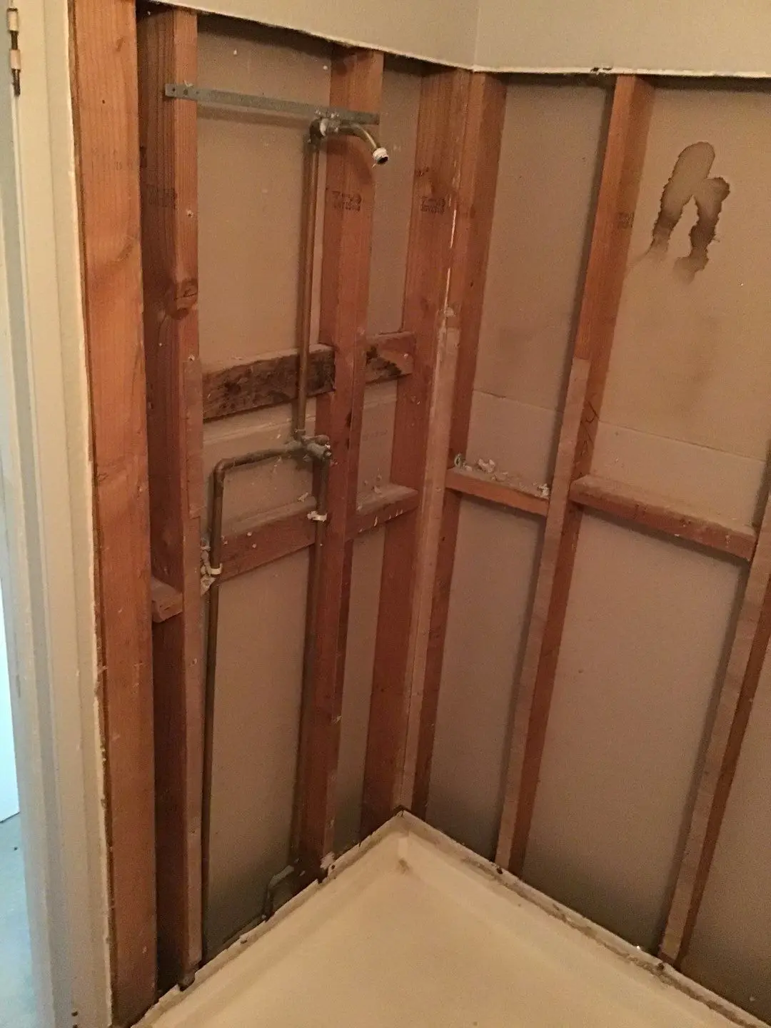 Documented damaged flooring, shower, or wall area 270 during Temecula water damage restoration project by PL Builders