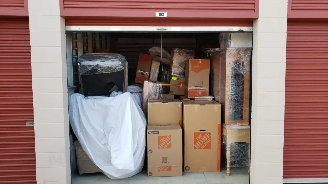 Packed and protected contents before reconstruction 97 during Temecula water damage restoration project by PL Builders