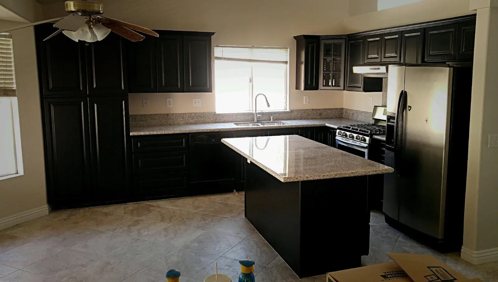 Finished kitchen after slab leak rebuild: Wildomar water damage restoration project by PL Builders showing slab leak kitchen water damage rebuild