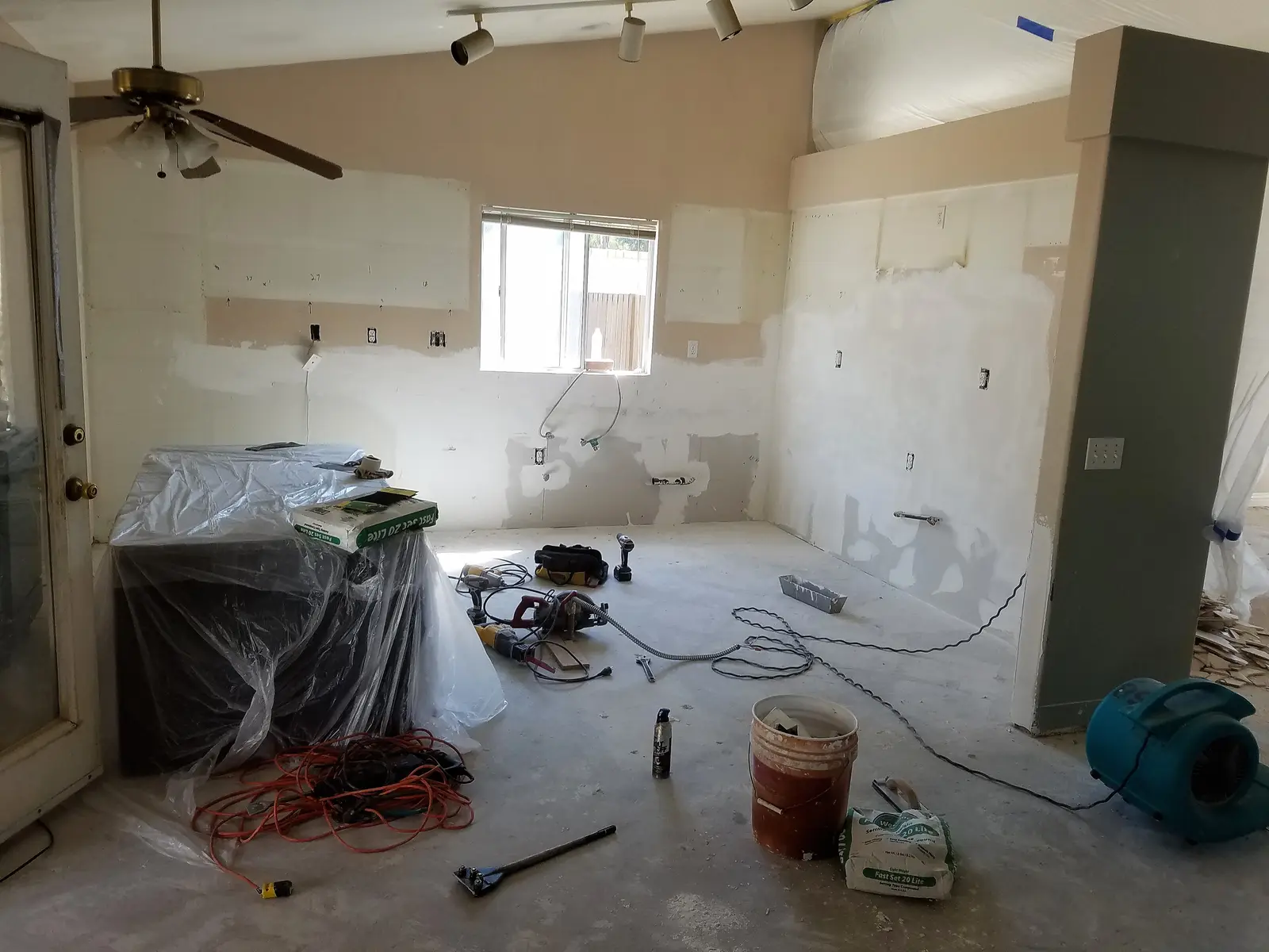 Wildomar water damage restoration project by PL Builders showing slab leak kitchen water damage rebuild