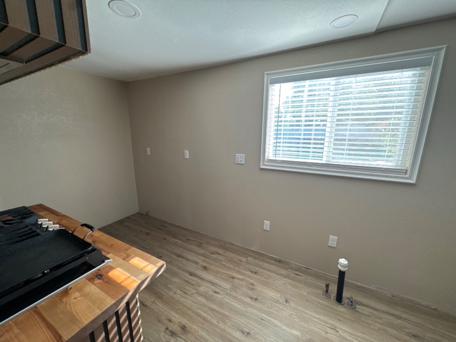 Before: Kitchen cabinets and Calacatta Pietra quartz with MSI Bianco Dolomite Cream Dotty backsplash — Reflection Lake, San Jacinto, CA — PL Builders