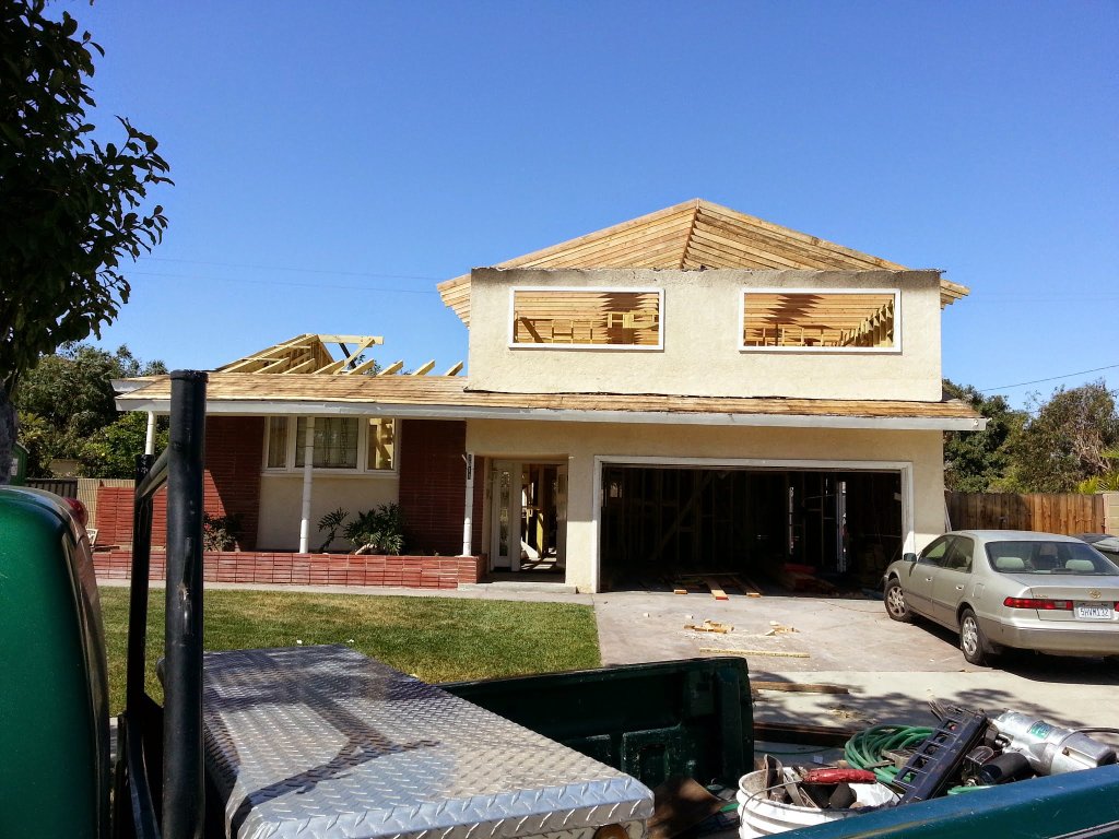 Exterior view of a second story fire rebuild in progress in Anaheim, CA